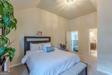 Discover this beautifully designed 4-sided brick home tucked on Crystal Lake Golf and Country Club in Georgia - for sale on GolfHomes.com, golf home, golf lot