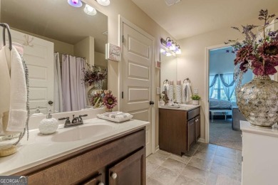 Discover this beautifully designed 4-sided brick home tucked on Crystal Lake Golf and Country Club in Georgia - for sale on GolfHomes.com, golf home, golf lot