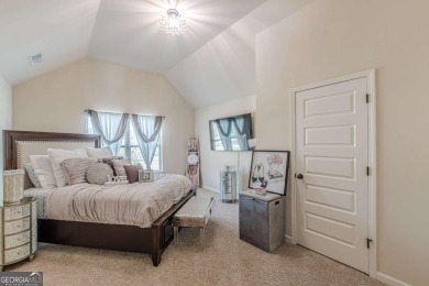 Discover this beautifully designed 4-sided brick home tucked on Crystal Lake Golf and Country Club in Georgia - for sale on GolfHomes.com, golf home, golf lot