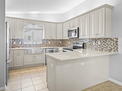Welcome to Spruce Creek South, a gated 55+ golf cart-friendly on The Links of Spruce Creek in Florida - for sale on GolfHomes.com, golf home, golf lot