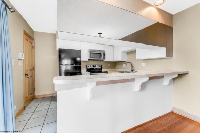 Welcome to this 2 bed, 3.5 bath contemporary end-unit townhome on Lakeview Golf Resort and Spa - Lakeview in West Virginia - for sale on GolfHomes.com, golf home, golf lot