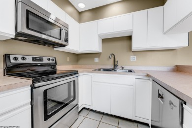 Welcome to this 2 bed, 3.5 bath contemporary end-unit townhome on Lakeview Golf Resort and Spa - Lakeview in West Virginia - for sale on GolfHomes.com, golf home, golf lot
