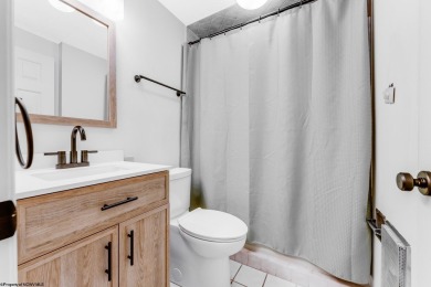 Welcome to this 2 bed, 3.5 bath contemporary end-unit townhome on Lakeview Golf Resort and Spa - Lakeview in West Virginia - for sale on GolfHomes.com, golf home, golf lot