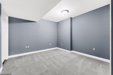 Welcome to this 2 bed, 3.5 bath contemporary end-unit townhome on Lakeview Golf Resort and Spa - Lakeview in West Virginia - for sale on GolfHomes.com, golf home, golf lot