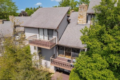 Welcome to this 2 bed, 3.5 bath contemporary end-unit townhome on Lakeview Golf Resort and Spa - Lakeview in West Virginia - for sale on GolfHomes.com, golf home, golf lot