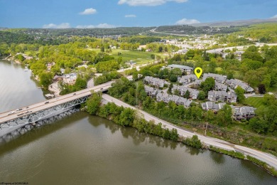 Welcome to this 2 bed, 3.5 bath contemporary end-unit townhome on Lakeview Golf Resort and Spa - Lakeview in West Virginia - for sale on GolfHomes.com, golf home, golf lot