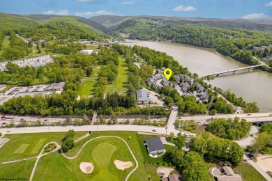 Welcome to this 2 bed, 3.5 bath contemporary end-unit townhome on Lakeview Golf Resort and Spa - Lakeview in West Virginia - for sale on GolfHomes.com, golf home, golf lot