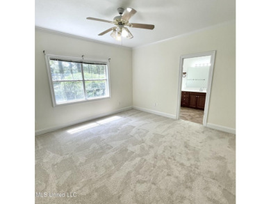 Beautiful 3-bedroom, 2-bath home situated on 1 acre overlooking on Pine Creek Golf Club in Mississippi - for sale on GolfHomes.com, golf home, golf lot