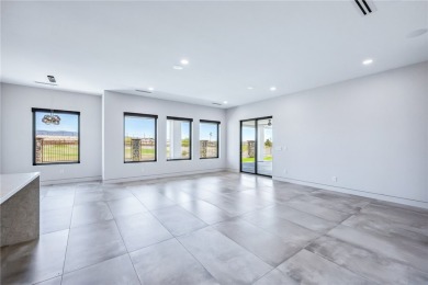 Located at 2446 E La Mancha in the prestigious gated community on Los Lagos Golf Club in Arizona - for sale on GolfHomes.com, golf home, golf lot