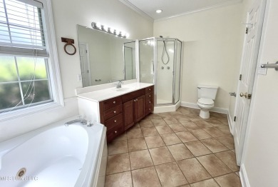 Beautiful 3-bedroom, 2-bath home situated on 1 acre overlooking on Pine Creek Golf Club in Mississippi - for sale on GolfHomes.com, golf home, golf lot