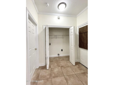 Beautiful 3-bedroom, 2-bath home situated on 1 acre overlooking on Pine Creek Golf Club in Mississippi - for sale on GolfHomes.com, golf home, golf lot