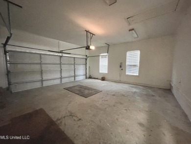 Beautiful 3-bedroom, 2-bath home situated on 1 acre overlooking on Pine Creek Golf Club in Mississippi - for sale on GolfHomes.com, golf home, golf lot