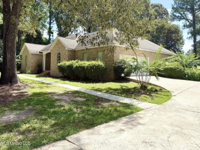 Beautiful 3-bedroom, 2-bath home situated on 1 acre overlooking on Pine Creek Golf Club in Mississippi - for sale on GolfHomes.com, golf home, golf lot
