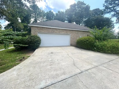 Beautiful 3-bedroom, 2-bath home situated on 1 acre overlooking on Pine Creek Golf Club in Mississippi - for sale on GolfHomes.com, golf home, golf lot