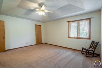 Don't miss this well-maintained and move-in-ready half-duplex on Lake Shawnee Golf Course in Kansas - for sale on GolfHomes.com, golf home, golf lot