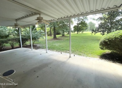 Beautiful 3-bedroom, 2-bath home situated on 1 acre overlooking on Pine Creek Golf Club in Mississippi - for sale on GolfHomes.com, golf home, golf lot