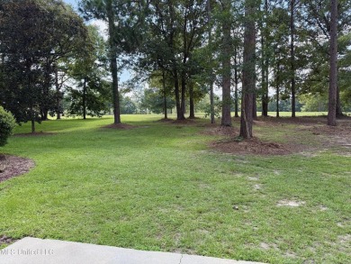 Beautiful 3-bedroom, 2-bath home situated on 1 acre overlooking on Pine Creek Golf Club in Mississippi - for sale on GolfHomes.com, golf home, golf lot