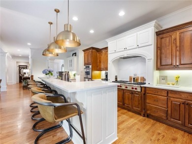 Discover timeless elegance and exceptional craftsmanship in this on Chateau Elan Golf Club  in Georgia - for sale on GolfHomes.com, golf home, golf lot