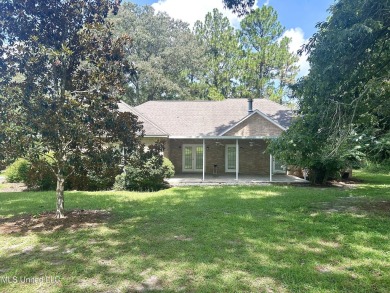 Beautiful 3-bedroom, 2-bath home situated on 1 acre overlooking on Pine Creek Golf Club in Mississippi - for sale on GolfHomes.com, golf home, golf lot