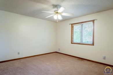 Don't miss this well-maintained and move-in-ready half-duplex on Lake Shawnee Golf Course in Kansas - for sale on GolfHomes.com, golf home, golf lot