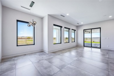 Located at 2446 E La Mancha in the prestigious gated community on Los Lagos Golf Club in Arizona - for sale on GolfHomes.com, golf home, golf lot