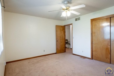 Don't miss this well-maintained and move-in-ready half-duplex on Lake Shawnee Golf Course in Kansas - for sale on GolfHomes.com, golf home, golf lot