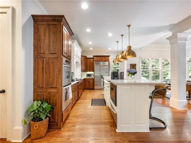 Discover timeless elegance and exceptional craftsmanship in this on Chateau Elan Golf Club  in Georgia - for sale on GolfHomes.com, golf home, golf lot