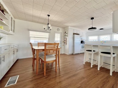 Welcome to this beautifully updated 2-bedroom, 2-bath home on Fairway Village Golf Course in Florida - for sale on GolfHomes.com, golf home, golf lot