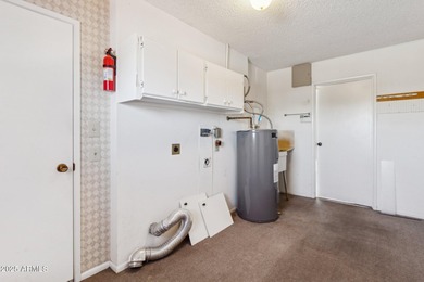 This Sun City home has 3 bedrooms and 2 updated bathrooms on Sun City Lakes West and East in Arizona - for sale on GolfHomes.com, golf home, golf lot