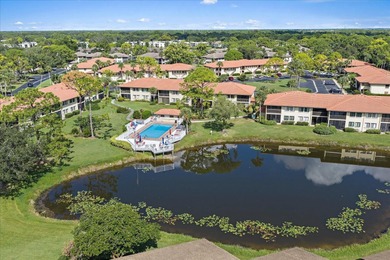 Under contract-accepting backup offers. Enjoy stunning lake on The Meadows Golf and Country Club in Florida - for sale on GolfHomes.com, golf home, golf lot