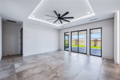 Located at 2446 E La Mancha in the prestigious gated community on Los Lagos Golf Club in Arizona - for sale on GolfHomes.com, golf home, golf lot