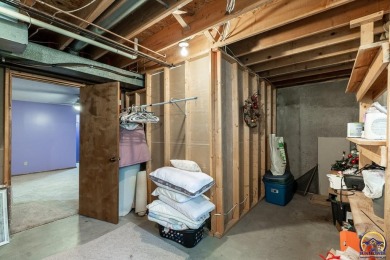 Don't miss this well-maintained and move-in-ready half-duplex on Lake Shawnee Golf Course in Kansas - for sale on GolfHomes.com, golf home, golf lot
