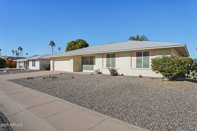 This Sun City home has 3 bedrooms and 2 updated bathrooms on Sun City Lakes West and East in Arizona - for sale on GolfHomes.com, golf home, golf lot