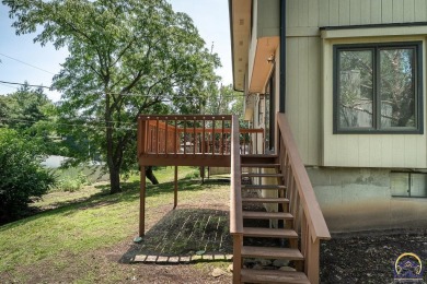 Don't miss this well-maintained and move-in-ready half-duplex on Lake Shawnee Golf Course in Kansas - for sale on GolfHomes.com, golf home, golf lot