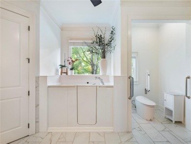 Discover timeless elegance and exceptional craftsmanship in this on Chateau Elan Golf Club  in Georgia - for sale on GolfHomes.com, golf home, golf lot