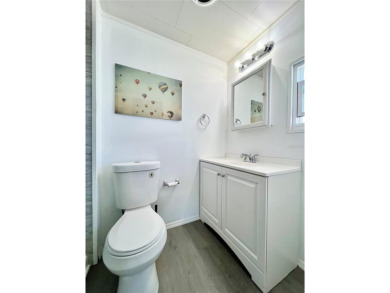 Welcome to this beautifully updated 2-bedroom, 2-bath home on Fairway Village Golf Course in Florida - for sale on GolfHomes.com, golf home, golf lot