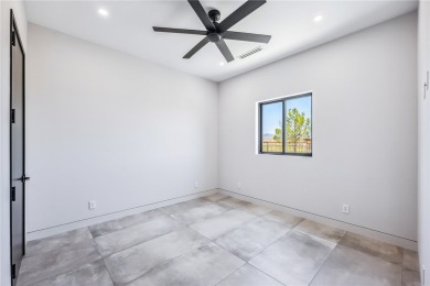 Located at 2446 E La Mancha in the prestigious gated community on Los Lagos Golf Club in Arizona - for sale on GolfHomes.com, golf home, golf lot