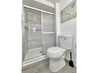 Welcome to this beautifully updated 2-bedroom, 2-bath home on Fairway Village Golf Course in Florida - for sale on GolfHomes.com, golf home, golf lot