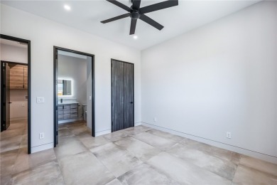 Located at 2446 E La Mancha in the prestigious gated community on Los Lagos Golf Club in Arizona - for sale on GolfHomes.com, golf home, golf lot