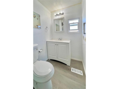 Welcome to this beautifully updated 2-bedroom, 2-bath home on Fairway Village Golf Course in Florida - for sale on GolfHomes.com, golf home, golf lot
