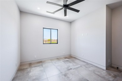 Located at 2446 E La Mancha in the prestigious gated community on Los Lagos Golf Club in Arizona - for sale on GolfHomes.com, golf home, golf lot