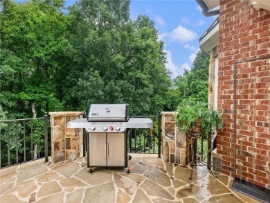 Discover timeless elegance and exceptional craftsmanship in this on Chateau Elan Golf Club  in Georgia - for sale on GolfHomes.com, golf home, golf lot