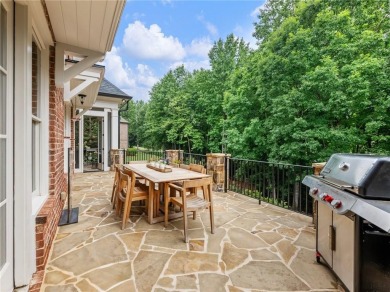 Discover timeless elegance and exceptional craftsmanship in this on Chateau Elan Golf Club  in Georgia - for sale on GolfHomes.com, golf home, golf lot