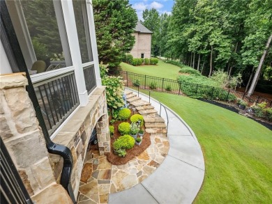 Discover timeless elegance and exceptional craftsmanship in this on Chateau Elan Golf Club  in Georgia - for sale on GolfHomes.com, golf home, golf lot