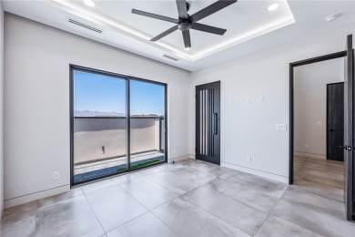 Located at 2446 E La Mancha in the prestigious gated community on Los Lagos Golf Club in Arizona - for sale on GolfHomes.com, golf home, golf lot