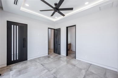 Located at 2446 E La Mancha in the prestigious gated community on Los Lagos Golf Club in Arizona - for sale on GolfHomes.com, golf home, golf lot