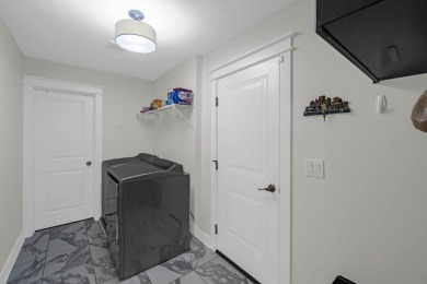 Step into this beautiful ranch-style home nestled on a spacious on Woodward Golf and Recreation in Iowa - for sale on GolfHomes.com, golf home, golf lot