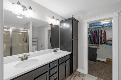 Step into this beautiful ranch-style home nestled on a spacious on Woodward Golf and Recreation in Iowa - for sale on GolfHomes.com, golf home, golf lot