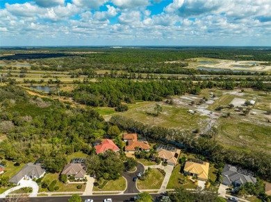 Nestled on a quaint cul-de-sac in the heart of Calusa Lakes is a on Calusa Lakes Golf Club in Florida - for sale on GolfHomes.com, golf home, golf lot