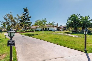 Beautifully appointed home nestled in Carlsbad's exclusive 55+ on Rancho Carlsbad Golf Club in California - for sale on GolfHomes.com, golf home, golf lot